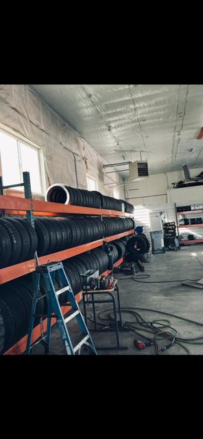 Shop interior with tire racks in Hubbard Oregon